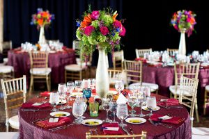 Centerpieces,Made,Of,Roses,,Asparagus,Fern,,Delphinium,,Asiatic,Lilies,,Wax